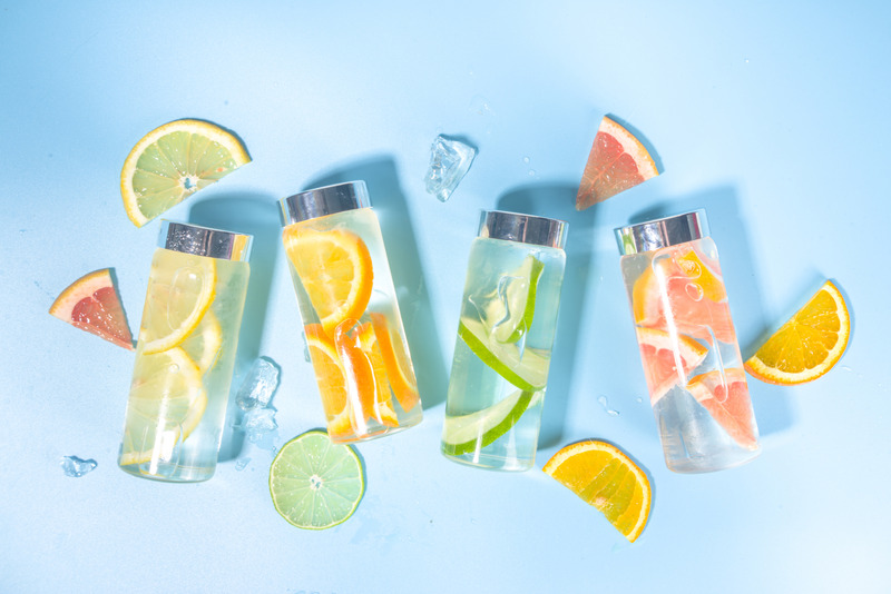 Bottles filled with water infused with fruits.