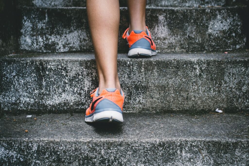 Woman walking up stairs